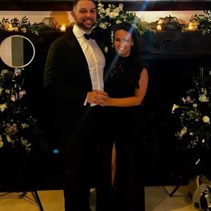 Black, long lace dress, with slit.